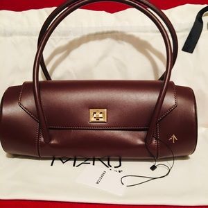 Manu Atelier Cylinder Handbag